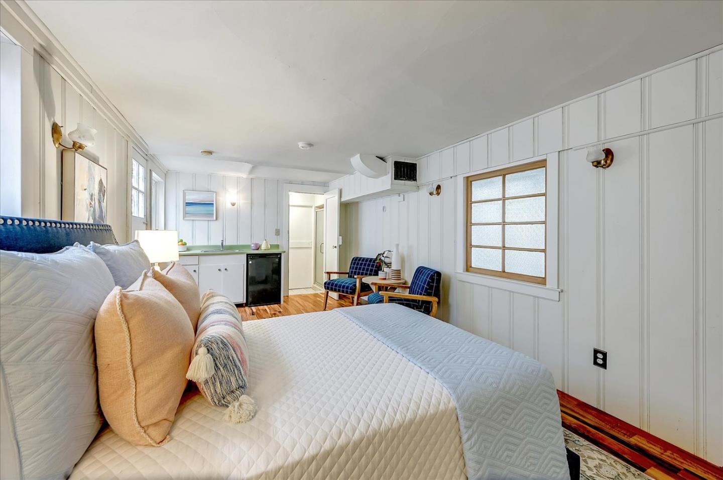 111 Genebern Way San Francisco, CA 94112 - Photo 23 of 37 a bed room with a bed and a window