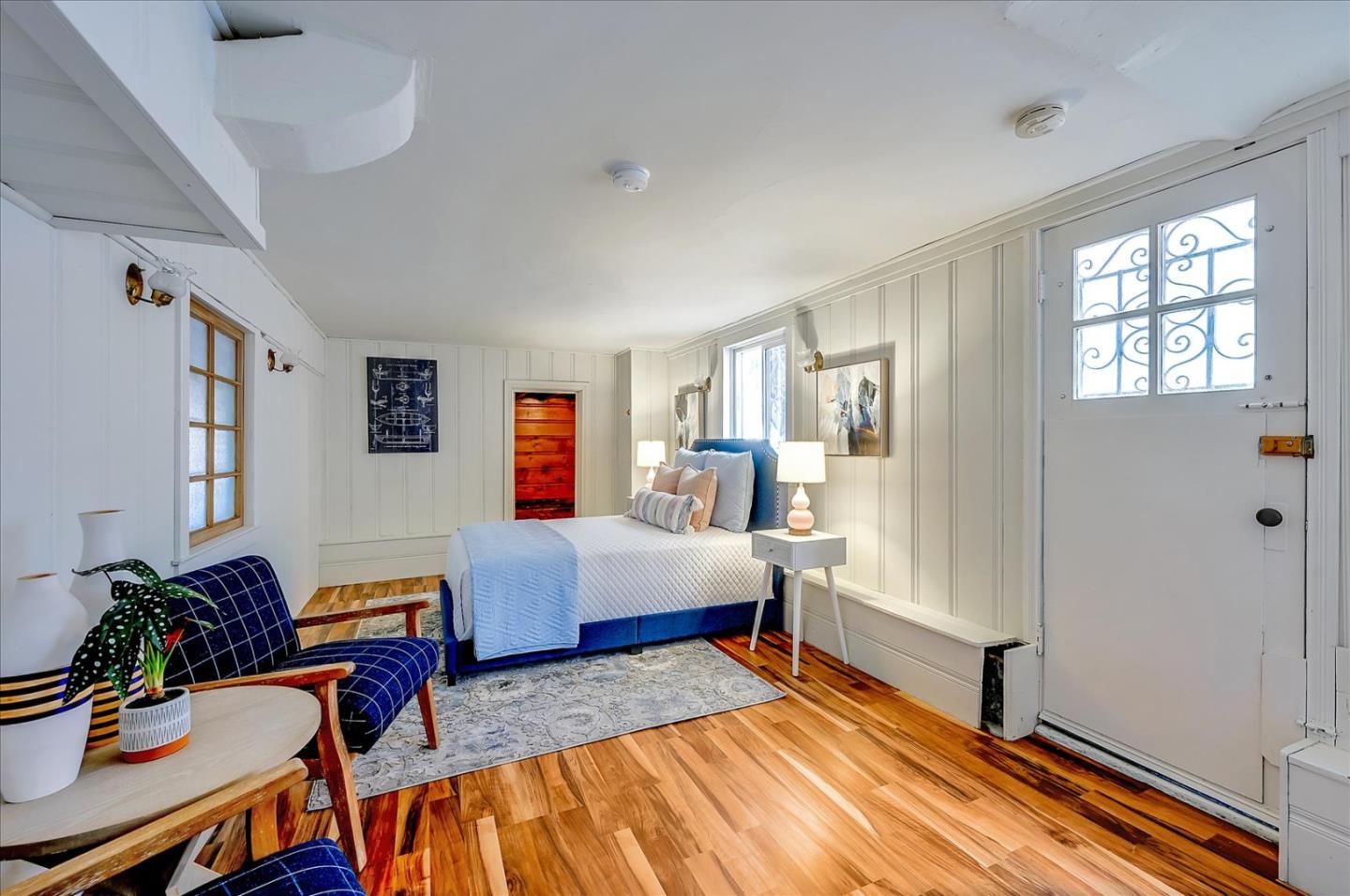 111 Genebern Way San Francisco, CA 94112 - Photo 24 of 37 a bedroom with furniture and wooden floor