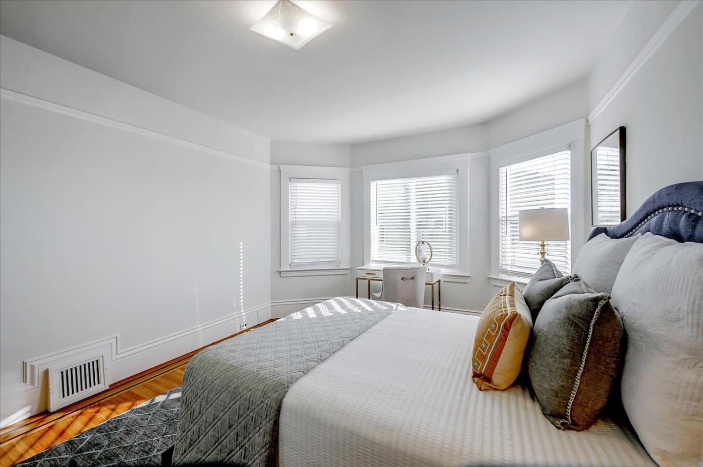 111 Genebern Way San Francisco, CA 94112 - Photo 28 of 37 a bedroom with a bed and a window