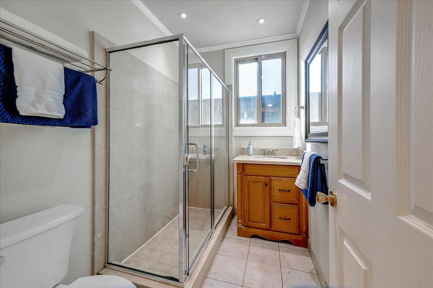 111 Genebern Way San Francisco, CA 94112 - Photo 32 of 37 a bathroom with a shower and a sink