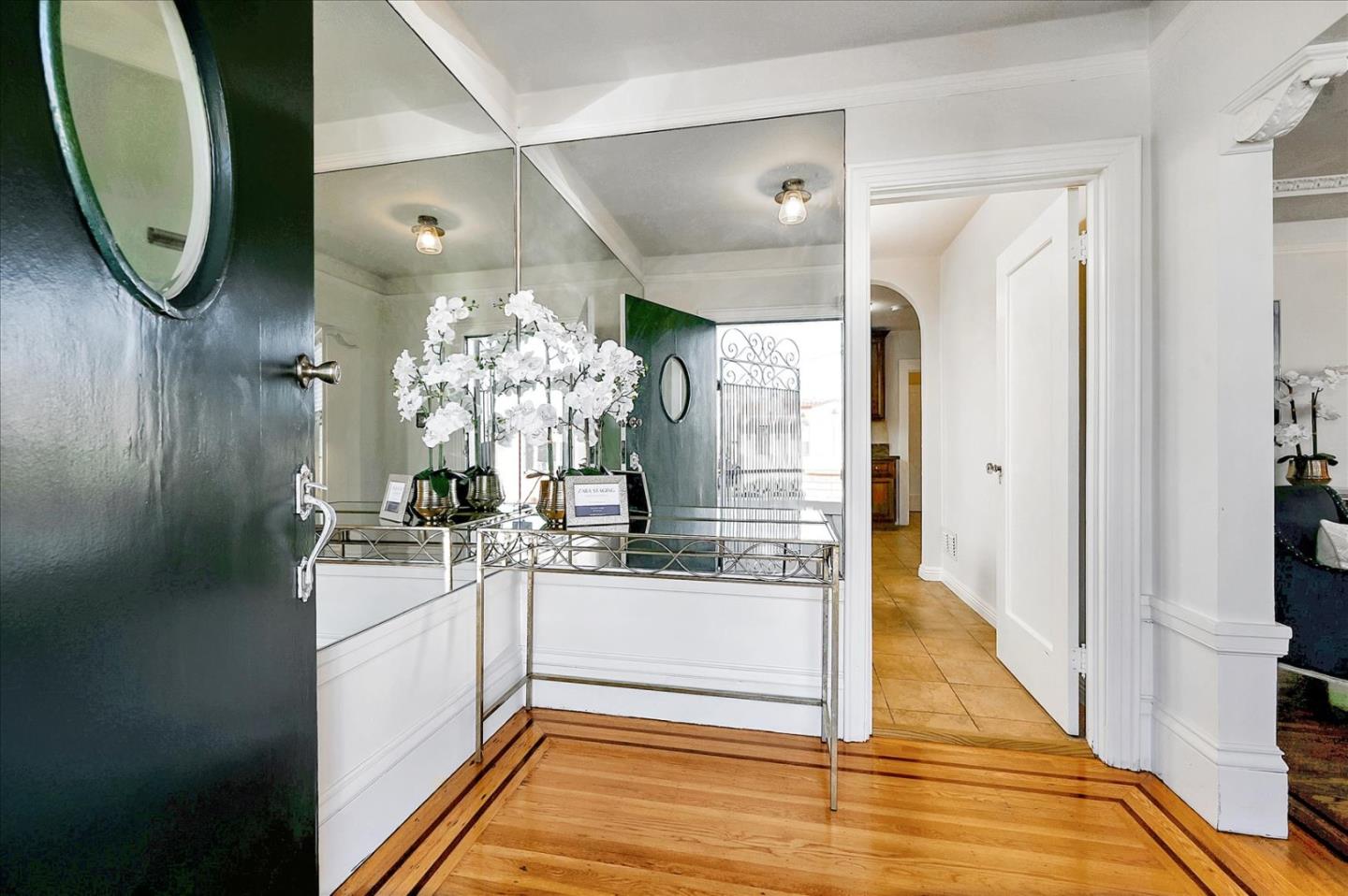 111 Genebern Way San Francisco, CA 94112 - Photo 4 of 37 a bathroom with a sink a mirror and a shower