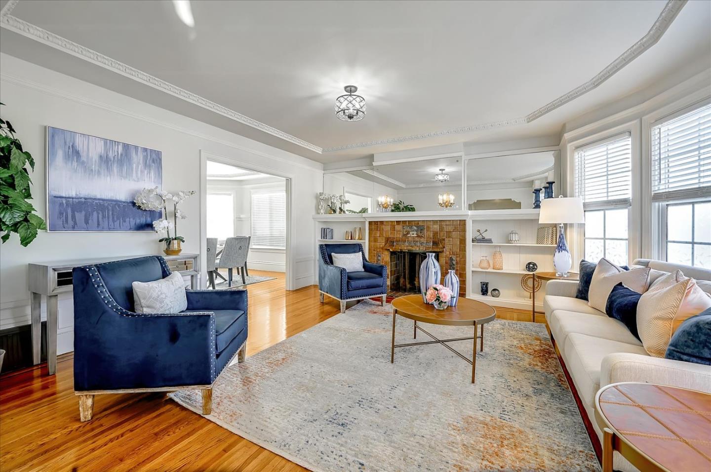 111 Genebern Way San Francisco, CA 94112 - Photo 6 of 37 a living room with furniture and a fireplace