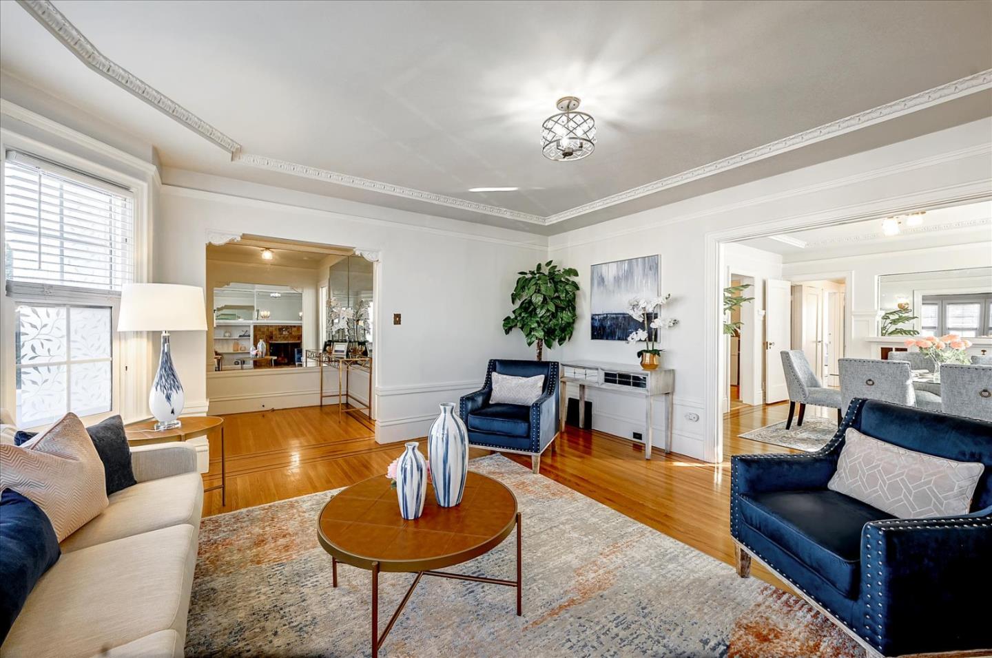 111 Genebern Way San Francisco, CA 94112 - Photo 8 of 37 a living room with furniture and a chandelier