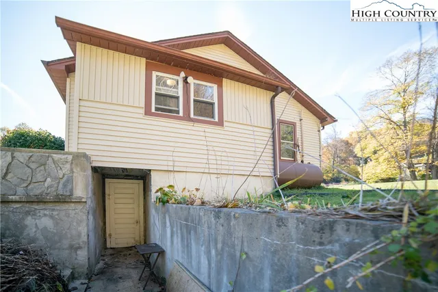 a front view of a house with garage