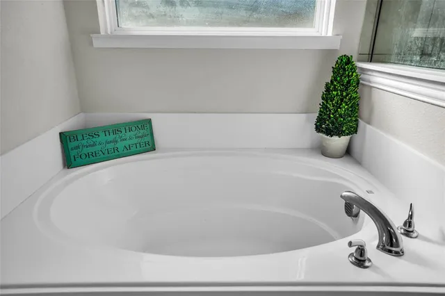 a bathroom with a bathtub