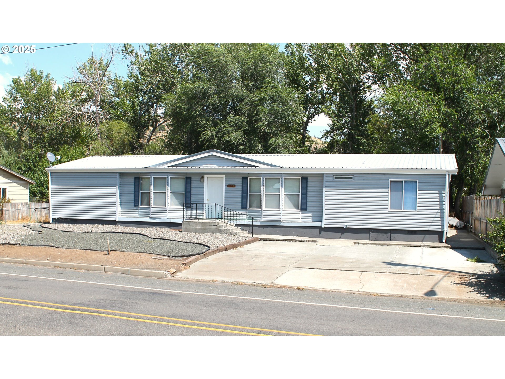a view of a house with a patio