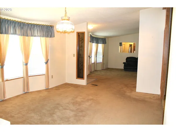 a view of a room with a chandelier