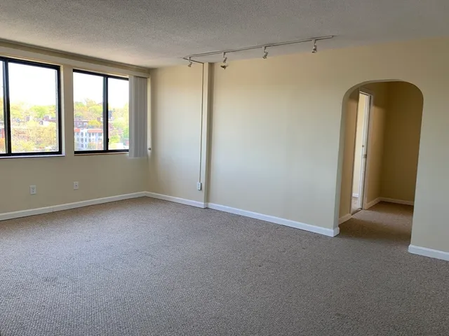 an empty room with windows