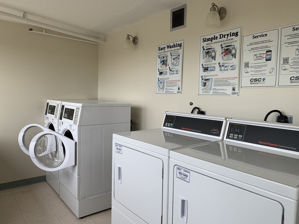 1731 Beacon Street, Unit 1213 Brookline, MA 02445 - Photo 29 of 29 a utility room with dryer and washer