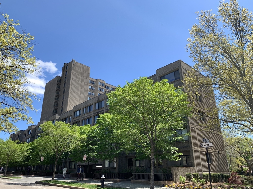 1731 Beacon Street, Unit 1213 Brookline, MA 02445 - Photo 3 of 29 a view of a tall building next to a road