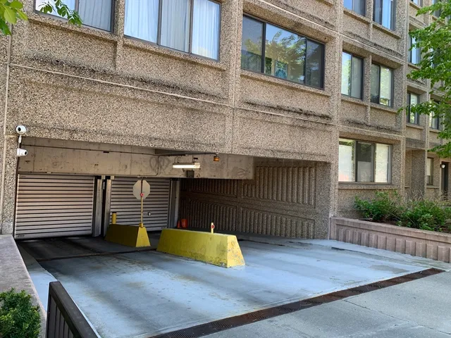 a view of a house with a balcony and door