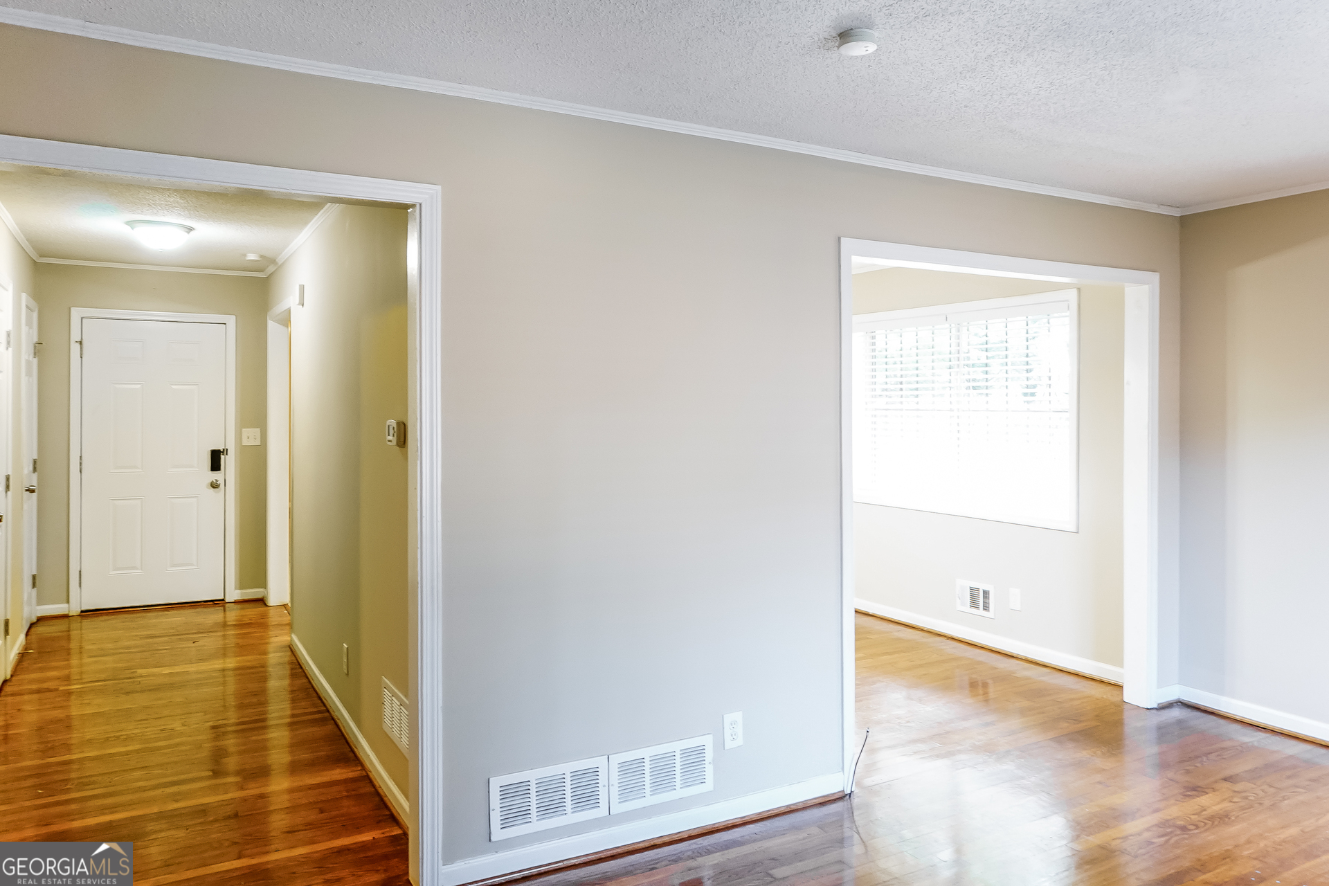 3762 Elkridge Drive Decatur, GA 30032 - Photo 14 of 16 a view of a room with wooden floor and cabinet