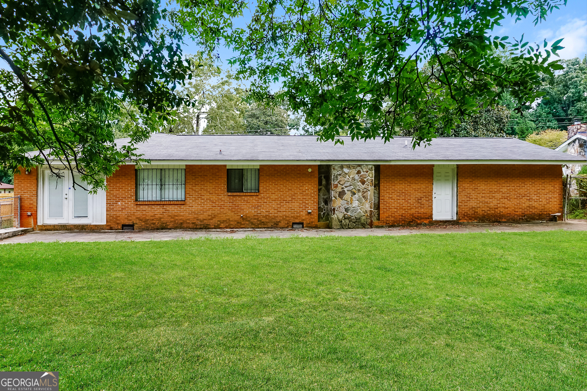 3762 Elkridge Drive Decatur, GA 30032 - Photo 15 of 16 a view of a back yard of the house