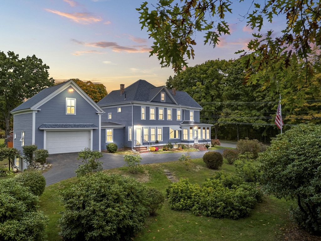46 South Hampton Road Amesbury, MA 01913 - Photo 1 of 42 a front view of a house with garden and porch