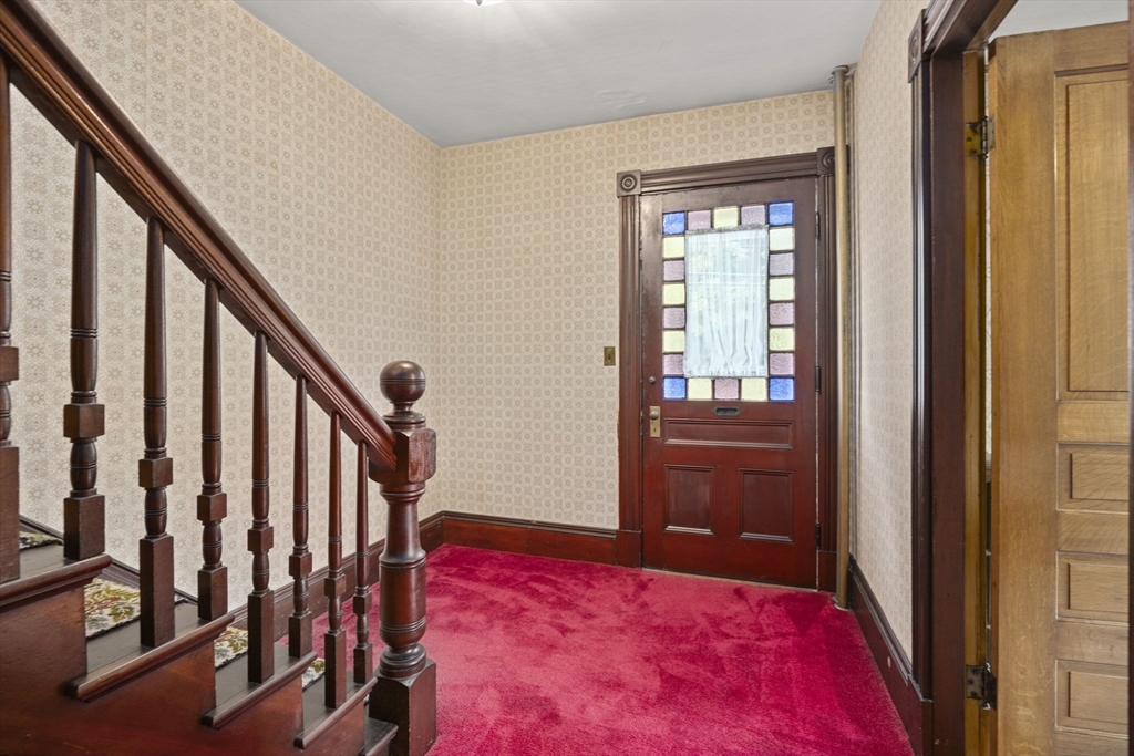 46 South Hampton Road Amesbury, MA 01913 - Photo 18 of 42 a view of a hallway with wooden floor and stairs
