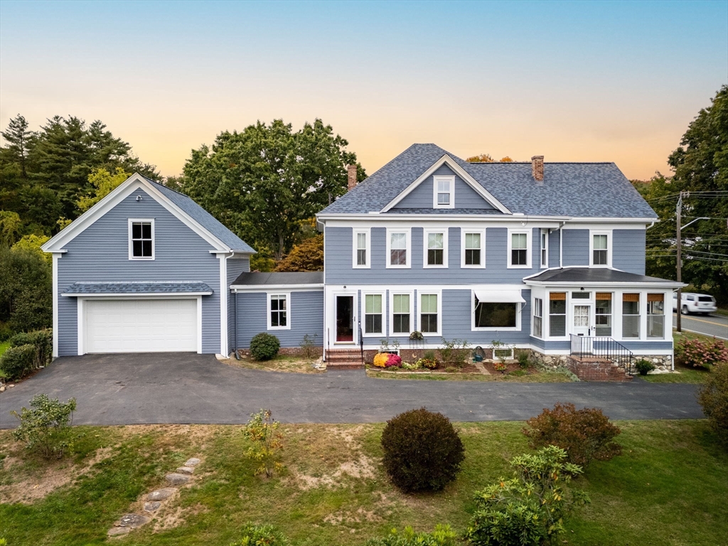 46 South Hampton Road Amesbury, MA 01913 - Photo 2 of 42 a front view of a house with a yard