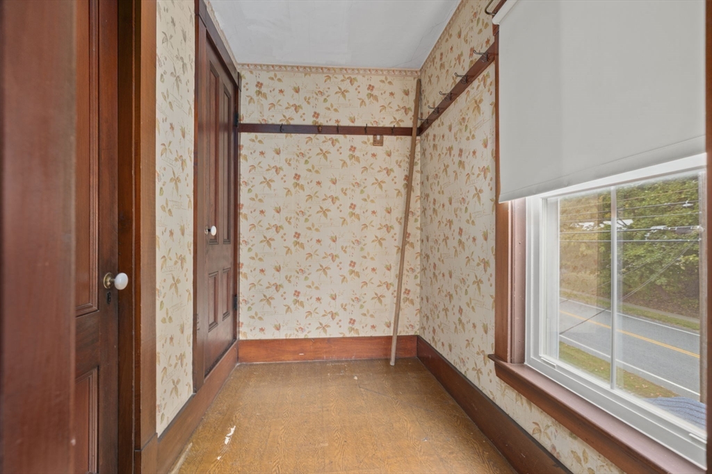 46 South Hampton Road Amesbury, MA 01913 - Photo 23 of 42 a view of a bathroom with a glass door and shower