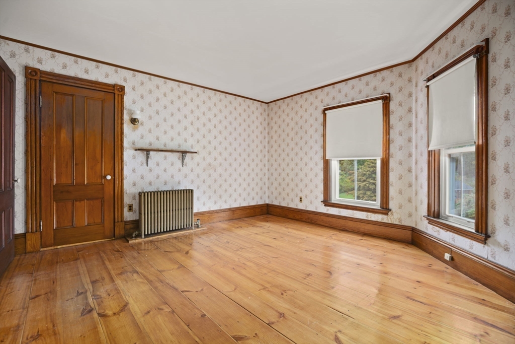46 South Hampton Road Amesbury, MA 01913 - Photo 25 of 42 a view of an empty room with a window and bathroom