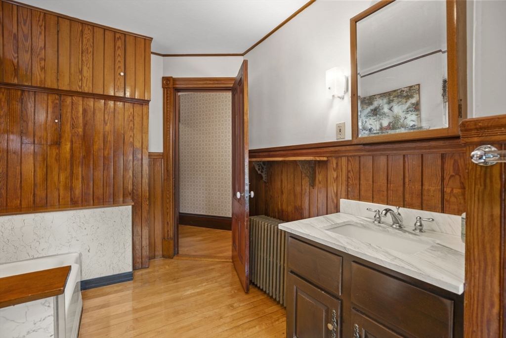46 South Hampton Road Amesbury, MA 01913 - Photo 30 of 42 a bathroom with a sink and a mirror