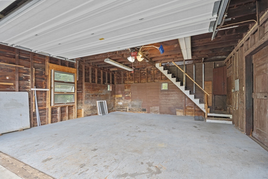 46 South Hampton Road Amesbury, MA 01913 - Photo 34 of 42 a view of an empty room with stairs
