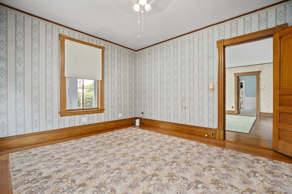 46 South Hampton Road Amesbury, MA 01913 - Photo 5 of 42 a view of an empty room and window
