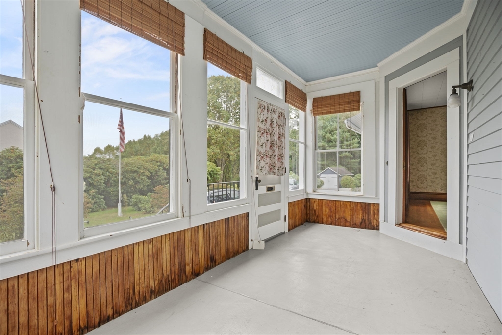 46 South Hampton Road Amesbury, MA 01913 - Photo 8 of 42 a bed room with a bed and a large window