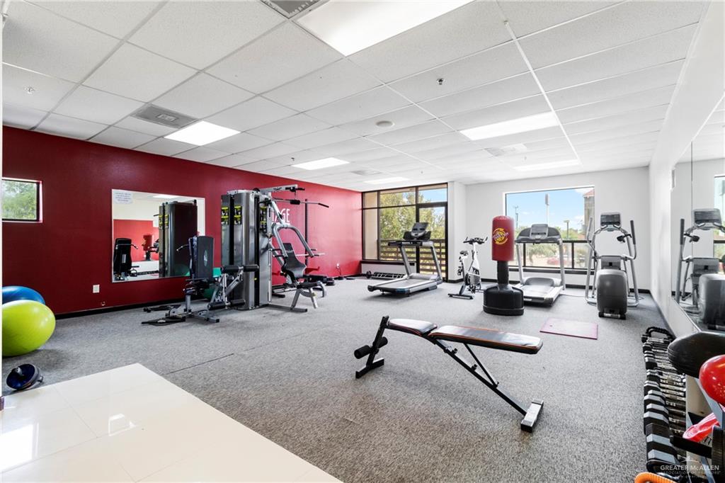 813 Travis Street, Unit 315 Mission, TX 78572 - Photo 19 of 25 a view of a room with gym equipment