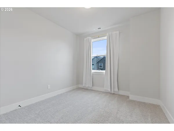 a view of empty room with window