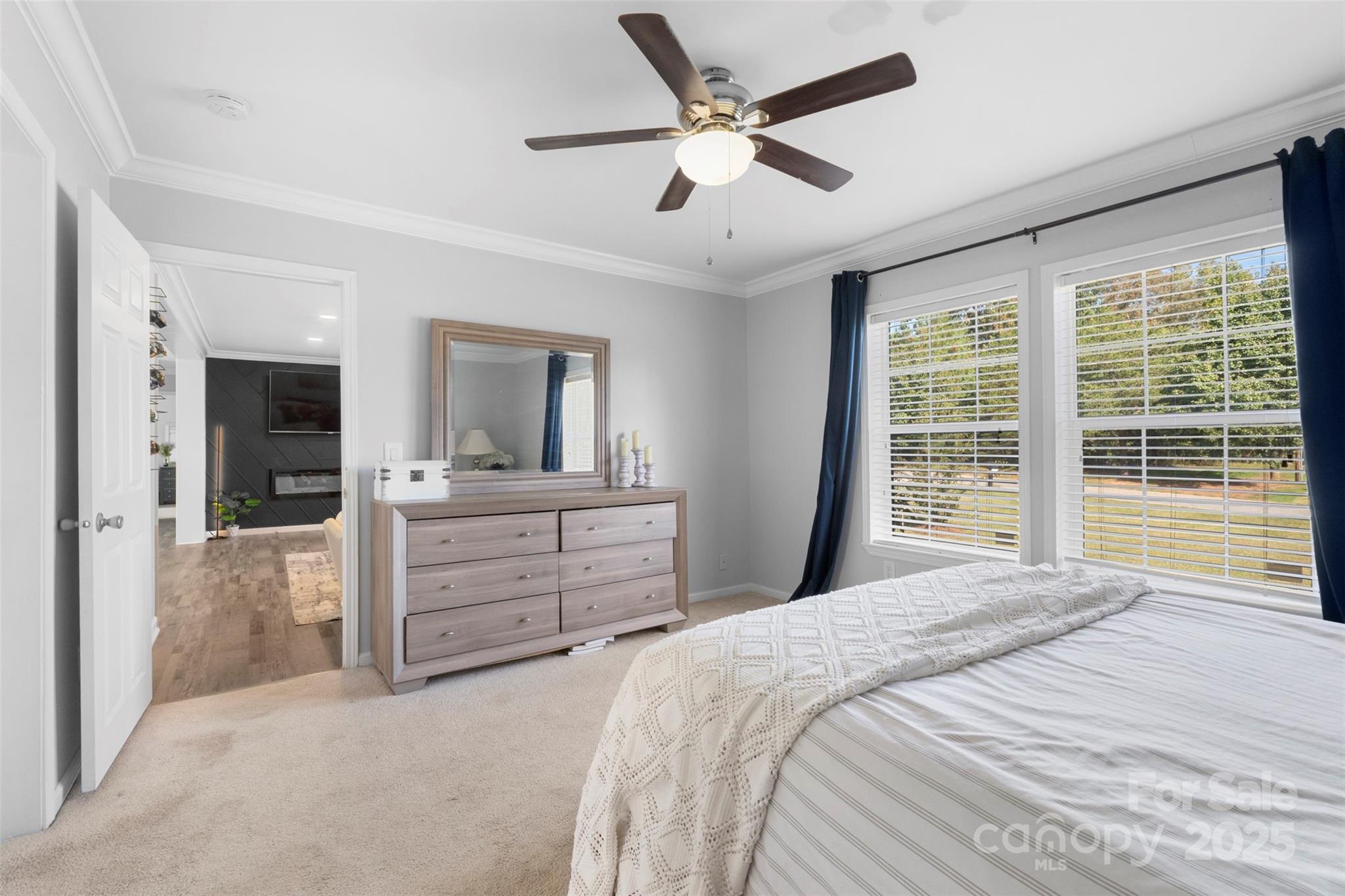 6601 Love Point Road Denver, NC 28037 - Photo 13 of 36 a bedroom with a bed and a dresser