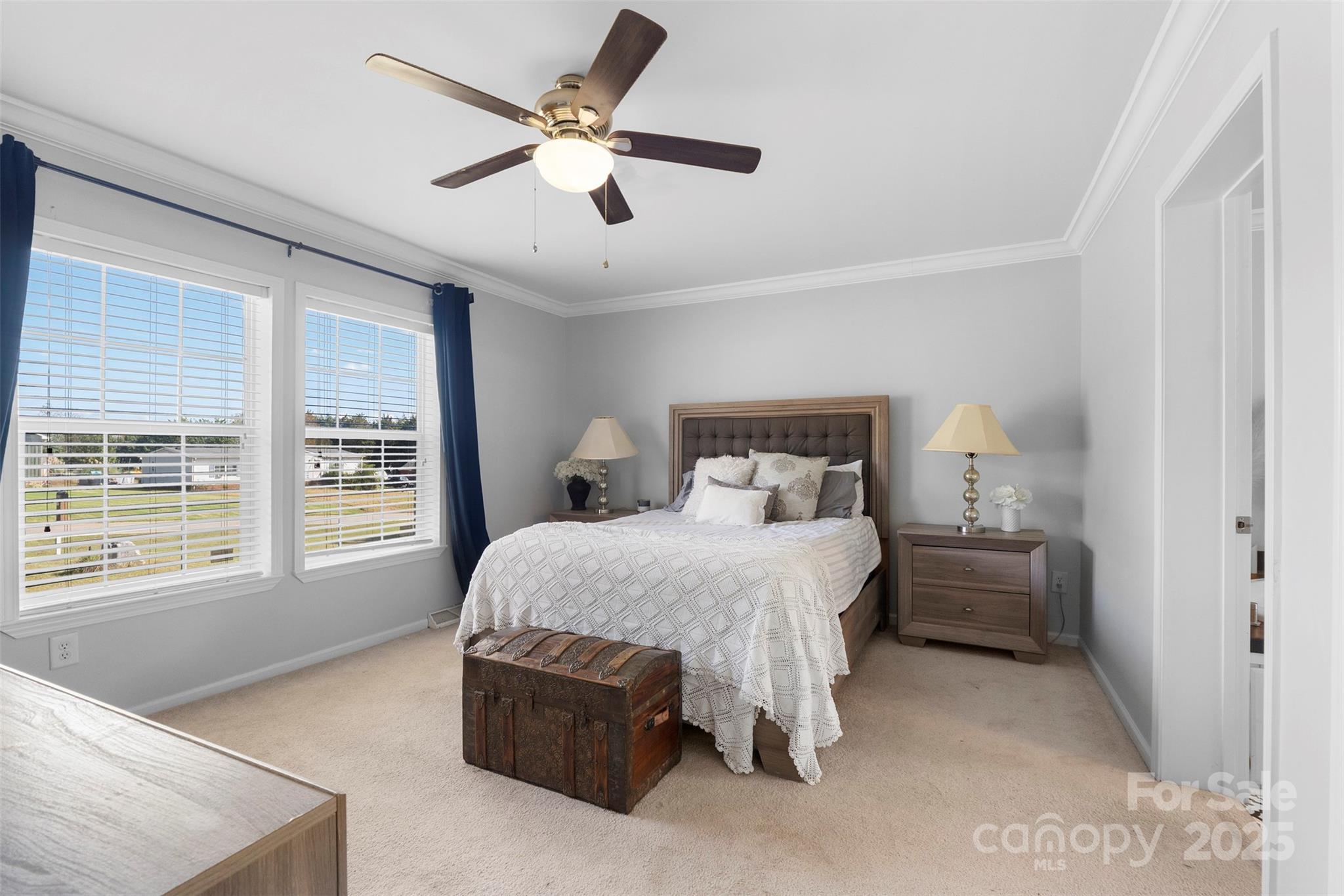 6601 Love Point Road Denver, NC 28037 - Photo 14 of 36 a bedroom with a bed and a large window