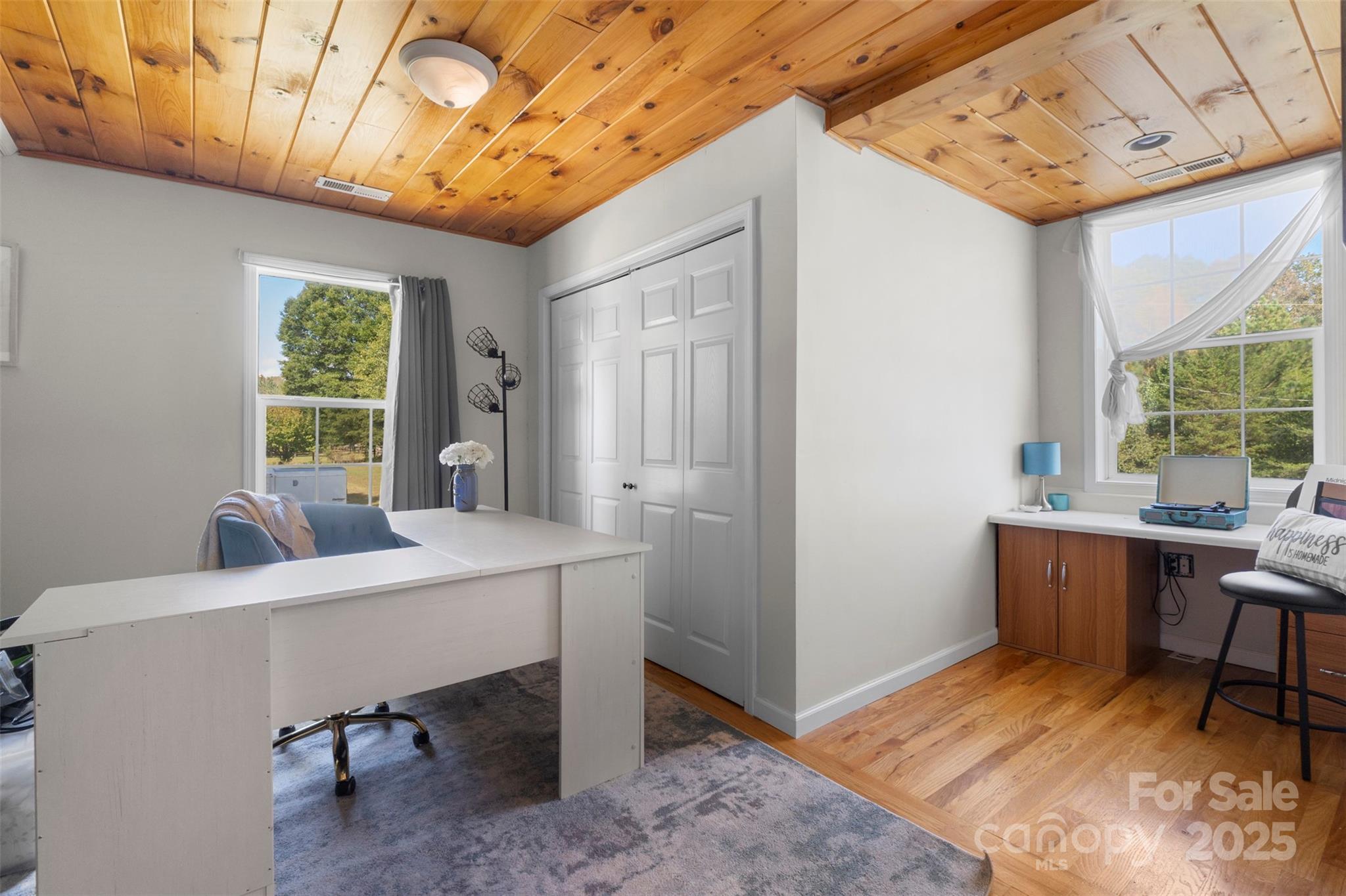6601 Love Point Road Denver, NC 28037 - Photo 21 of 36 a view of a workspace with furniture and a window