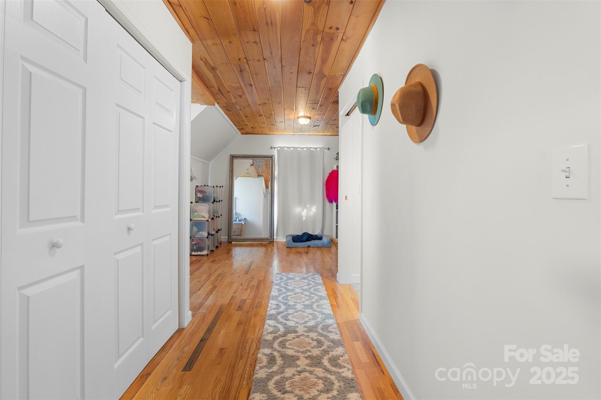 6601 Love Point Road Denver, NC 28037 - Photo 22 of 36 a view of a hallway with wooden floor