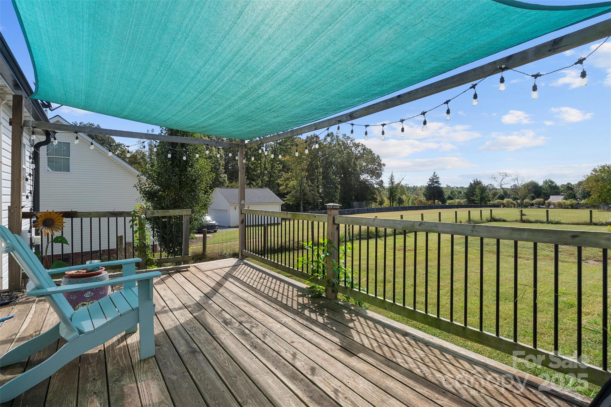6601 Love Point Road Denver, NC 28037 - Photo 25 of 36 a view of balcony with wooden floor and outdoor seating