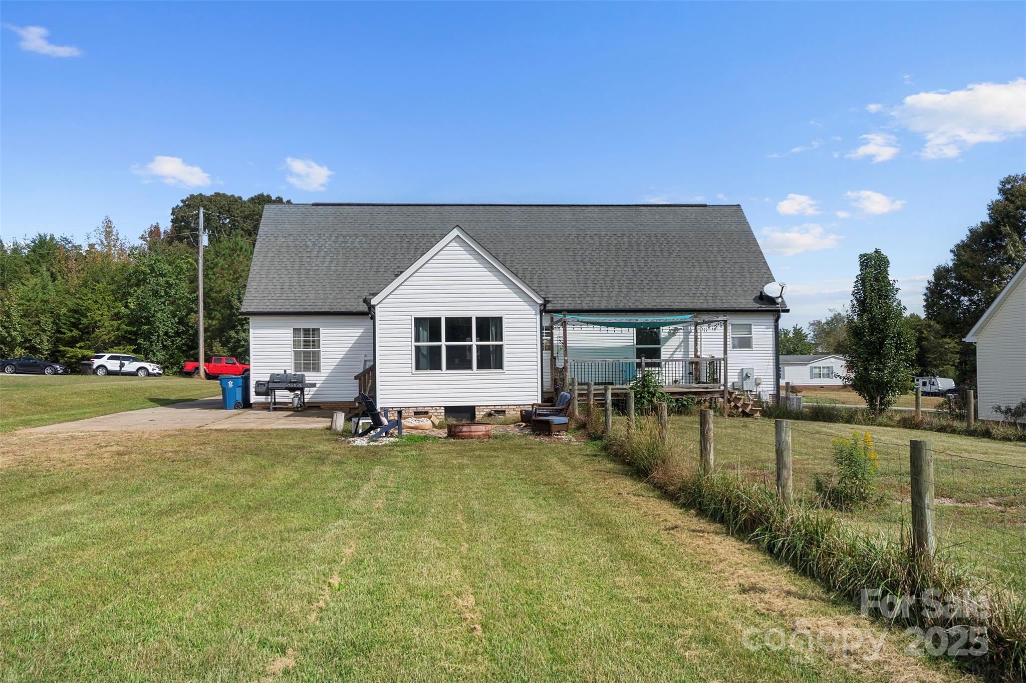6601 Love Point Road Denver, NC 28037 - Photo 27 of 36 a view of a house with backyard and sitting area