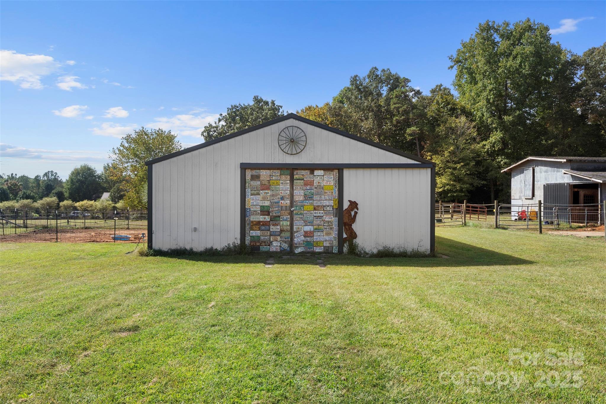 6601 Love Point Road Denver, NC 28037 - Photo 29 of 36 a front view of a house with yard and garage