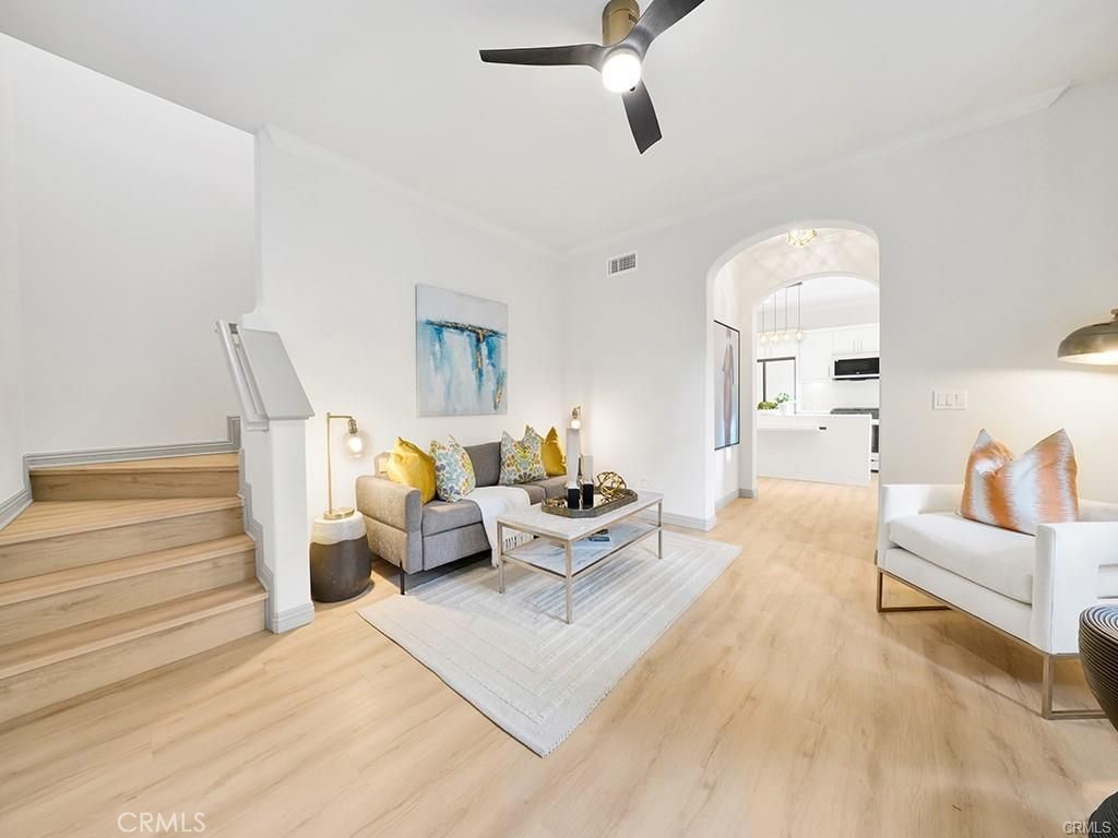 79 Modesto, Unit 96 Irvine, CA 92602 - Photo 23 of 35 Livingroom and Stairs to Second Floor