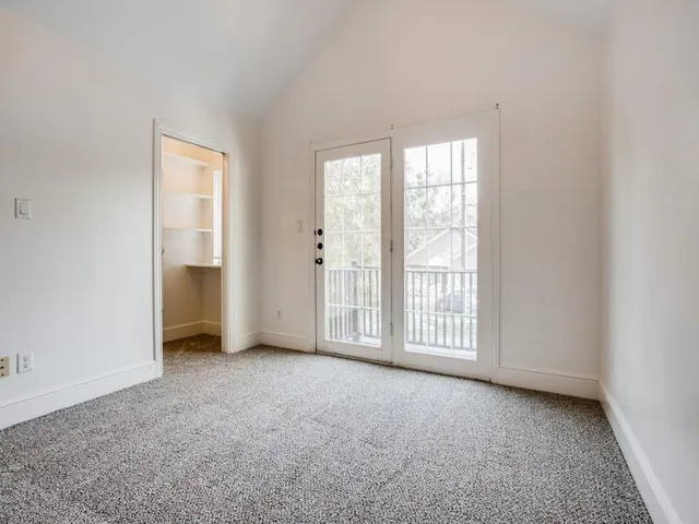 an empty room with windows