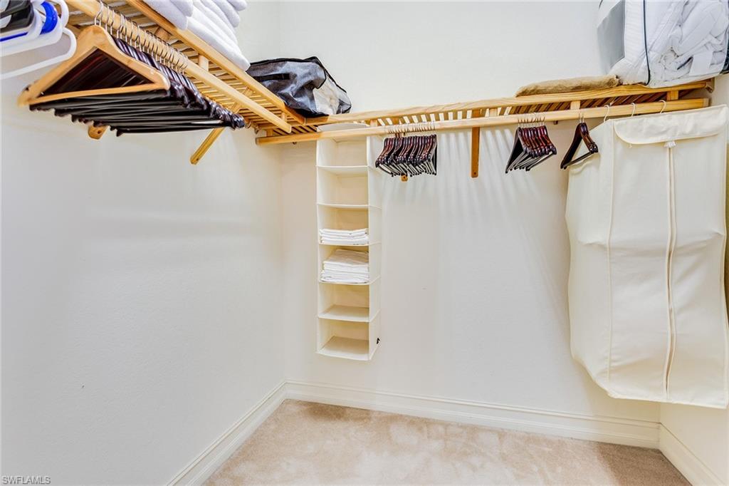 9088 Chula Vista Street, Unit 1083 Naples, FL 34113 - Photo 24 of 31 a view of walk in closet