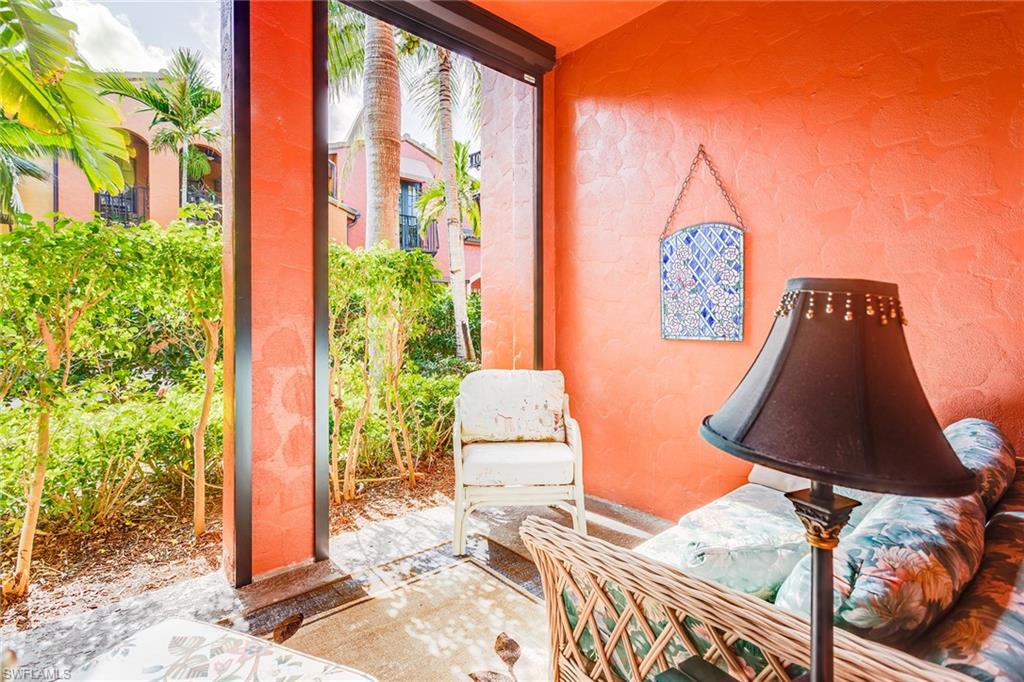 9088 Chula Vista Street, Unit 1083 Naples, FL 34113 - Photo 25 of 31 a view of balcony with furniture