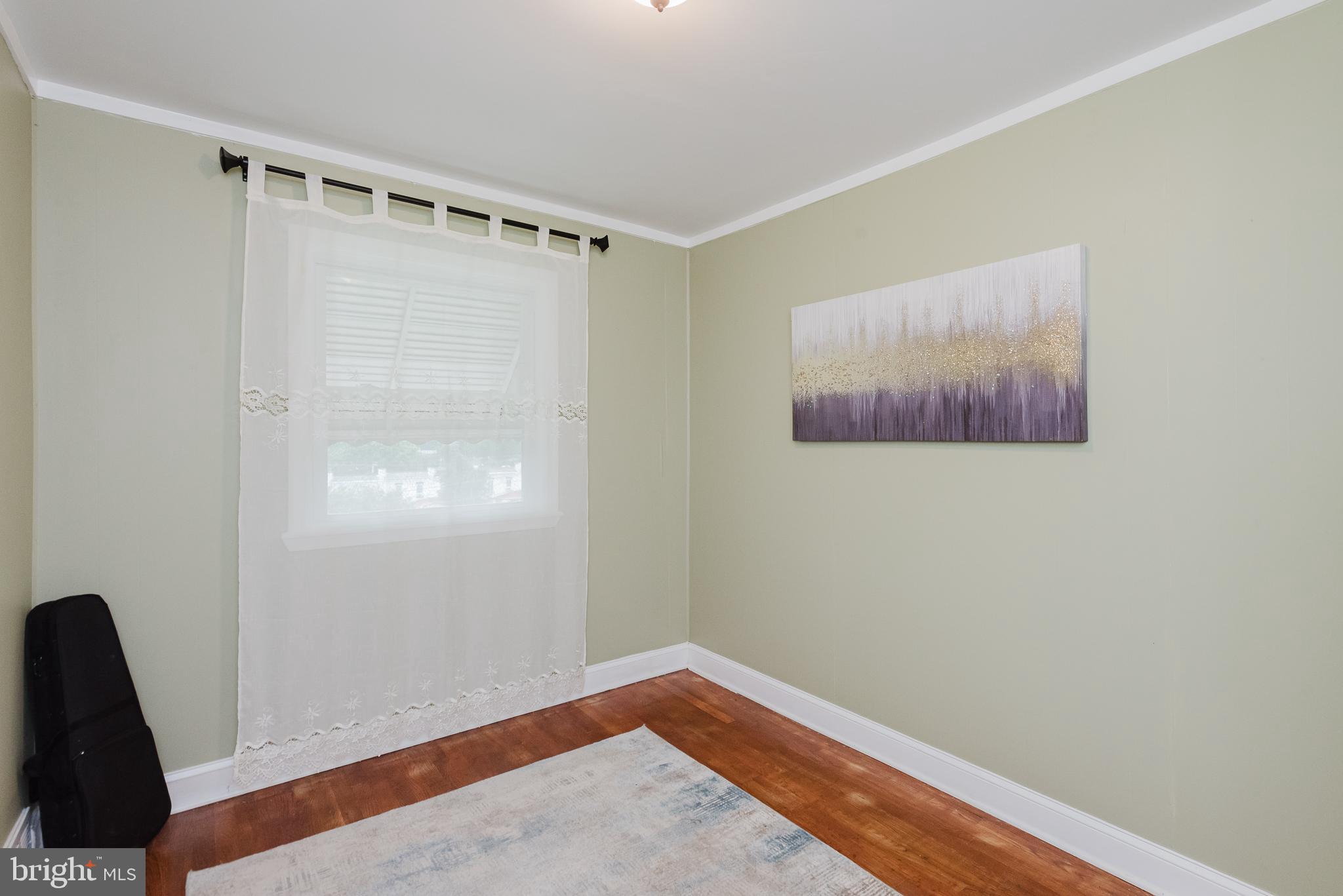 570 47th Street Baltimore, MD 21224 - Photo 20 of 41 a view of walk in closet with window