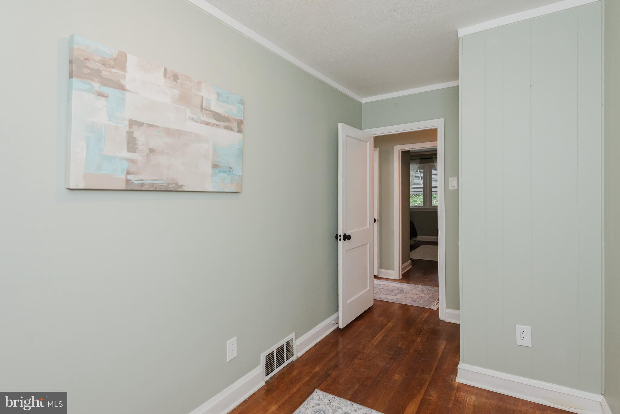 570 47th Street Baltimore, MD 21224 - Photo 26 of 41 a view of a hallway with wooden floor