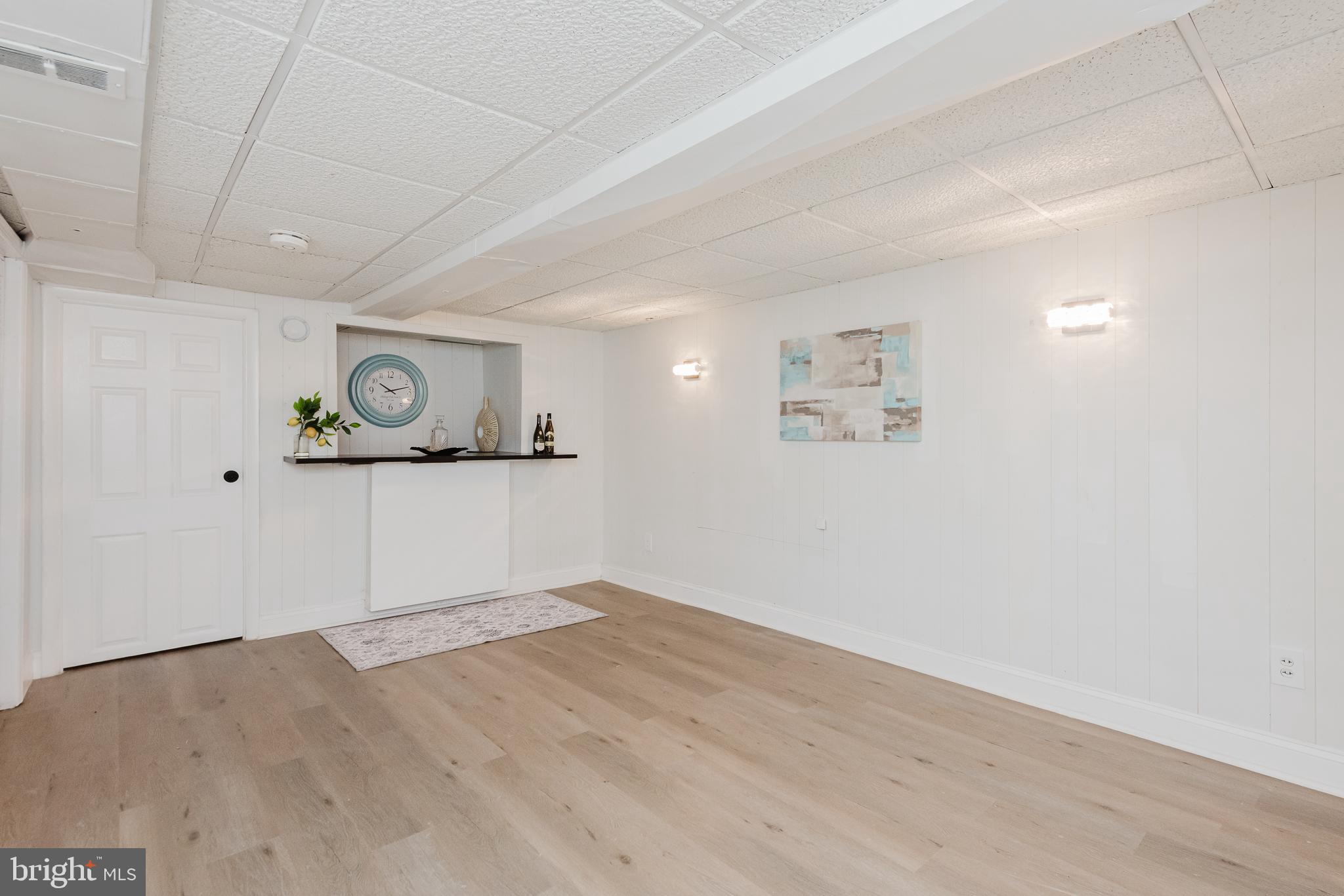 570 47th Street Baltimore, MD 21224 - Photo 29 of 41 wooden floor in an empty room