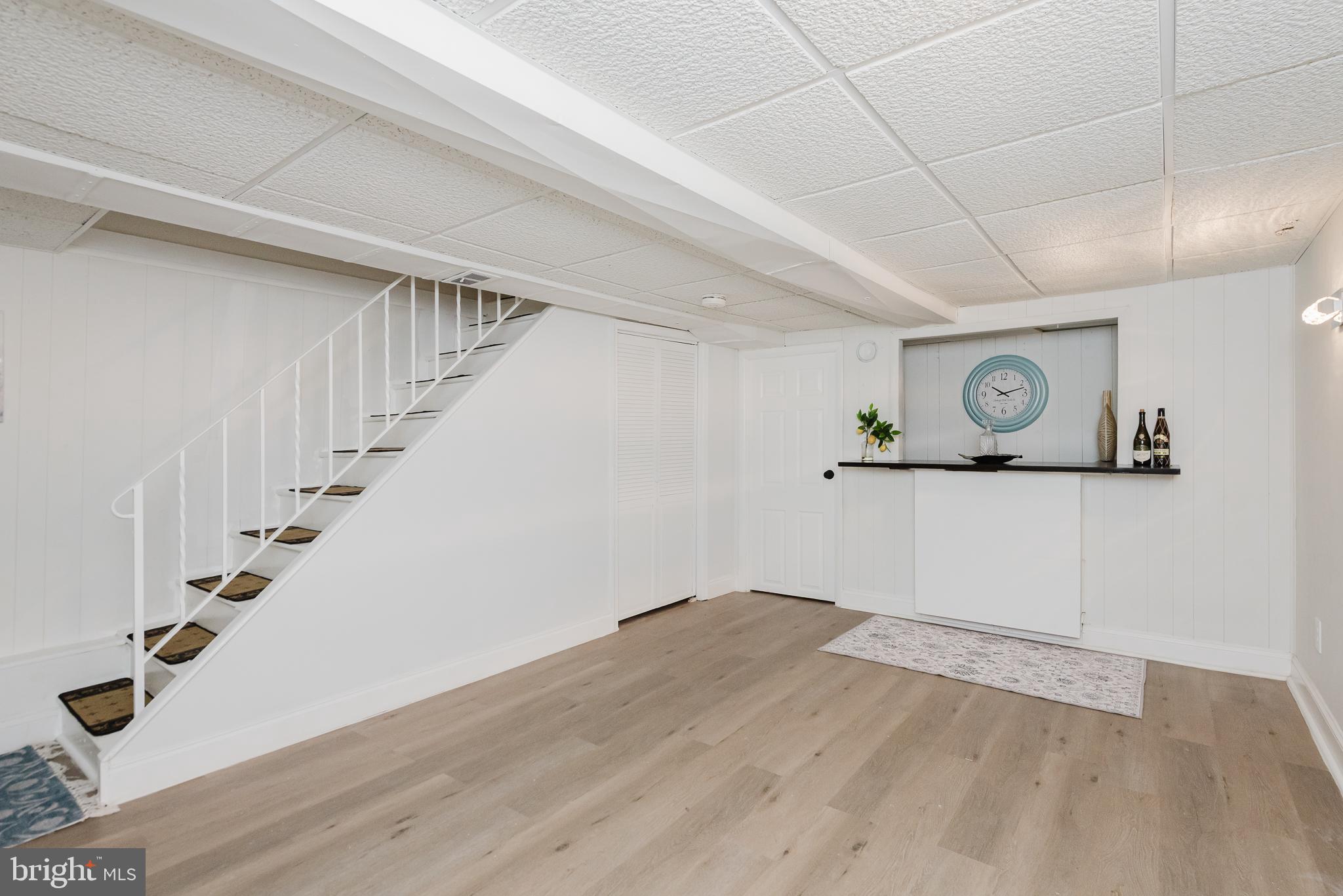 570 47th Street Baltimore, MD 21224 - Photo 30 of 41 a view of a hallway with stairs