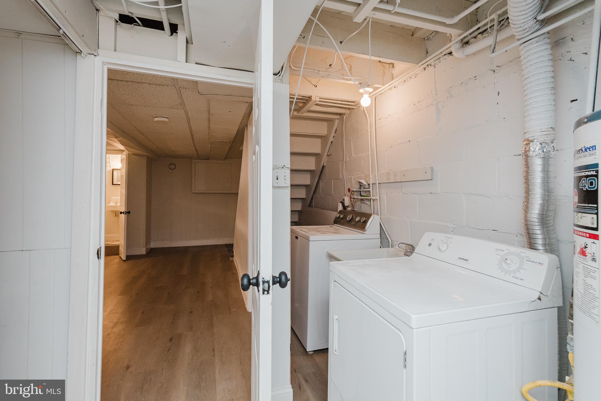 570 47th Street Baltimore, MD 21224 - Photo 35 of 41 a utility room with dryer and washer