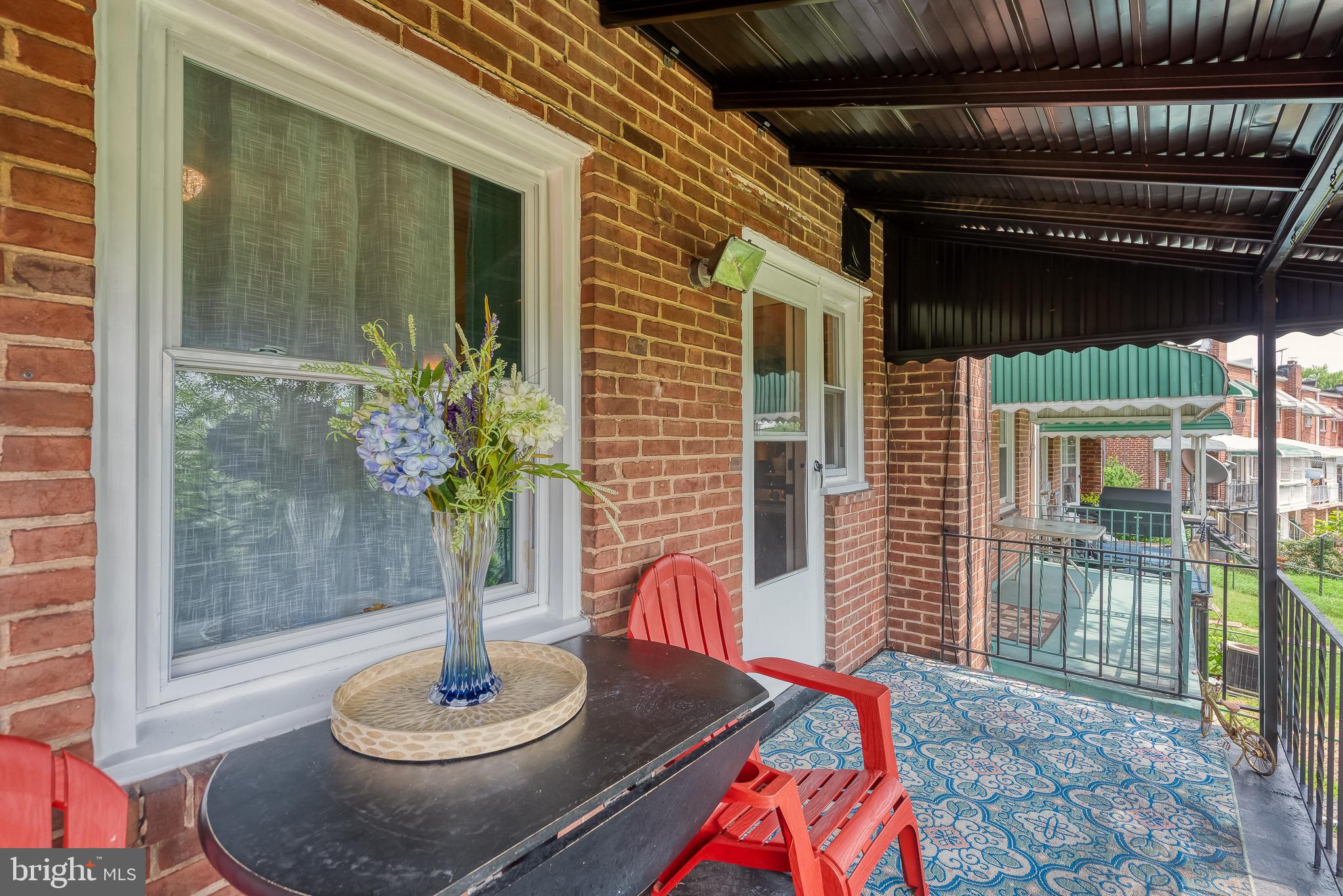 570 47th Street Baltimore, MD 21224 - Photo 38 of 41 a view of a porch with furniture