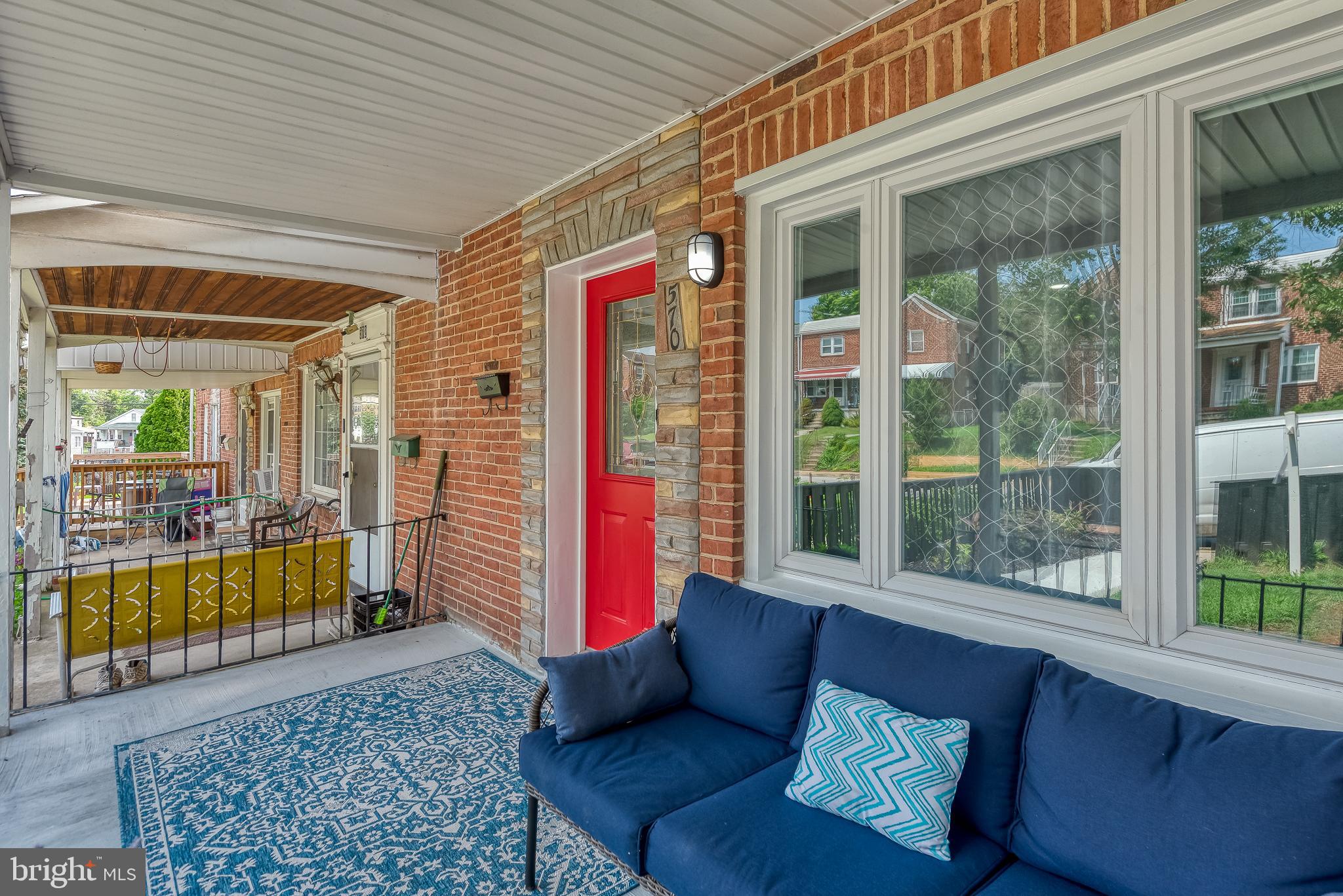 570 47th Street Baltimore, MD 21224 - Photo 4 of 41 a living room with furniture and a large window
