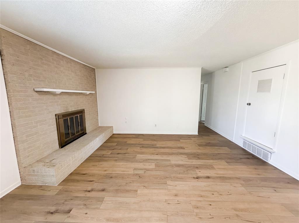 607 State Street Weatherford, TX 76086 - Photo 7 of 16 a view of a livingroom with a fireplace