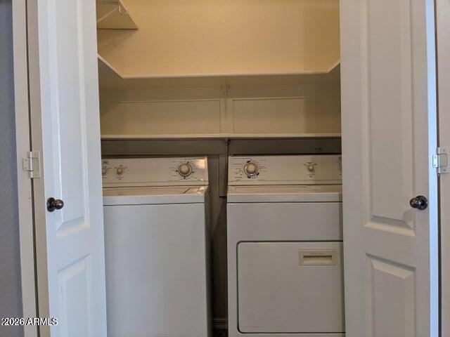 3150 East Beardsley Road, Unit 1045 Phoenix, AZ 85050 - Photo 19 of 23 a utility room with dryer and washer
