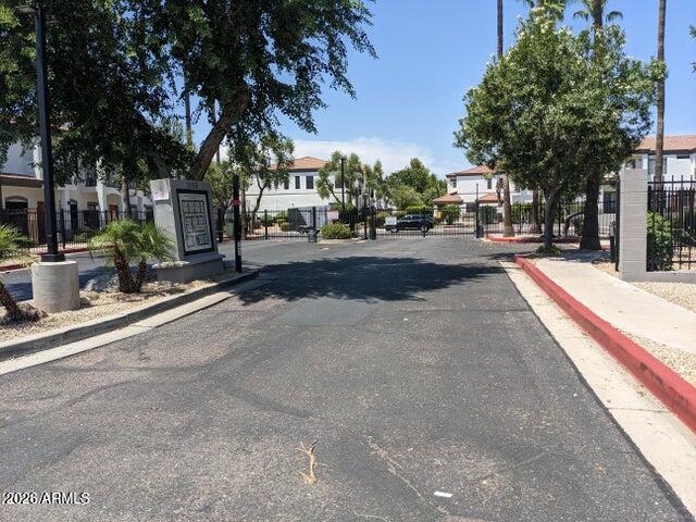 3150 East Beardsley Road, Unit 1045 Phoenix, AZ 85050 - Photo 23 of 23 a street view with large trees