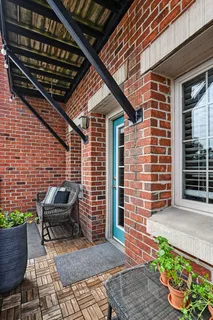a backyard of a house with seating space